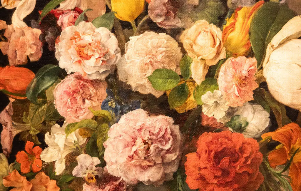 Painting of flowers in pink, yellow and red