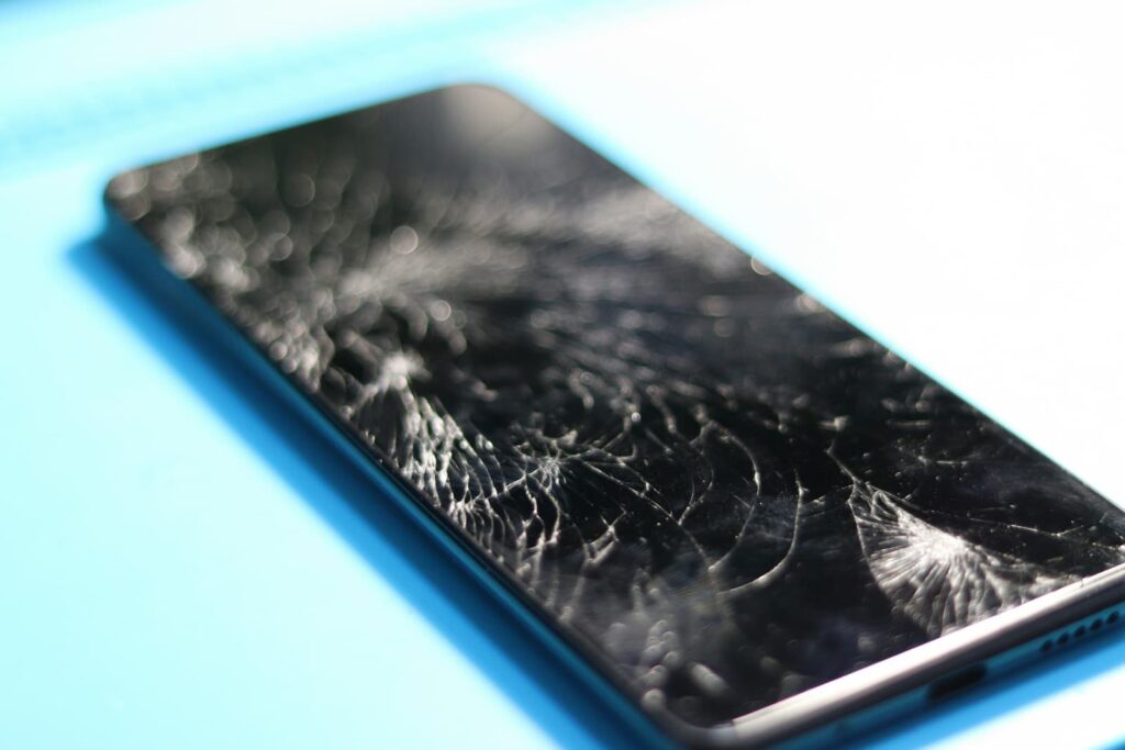 A smartphone with a broken screen
