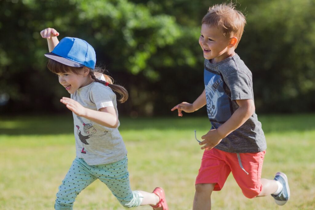 A boy trying to catch up with a girl.