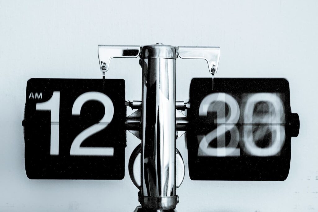 A clock rapidly moving through numbers