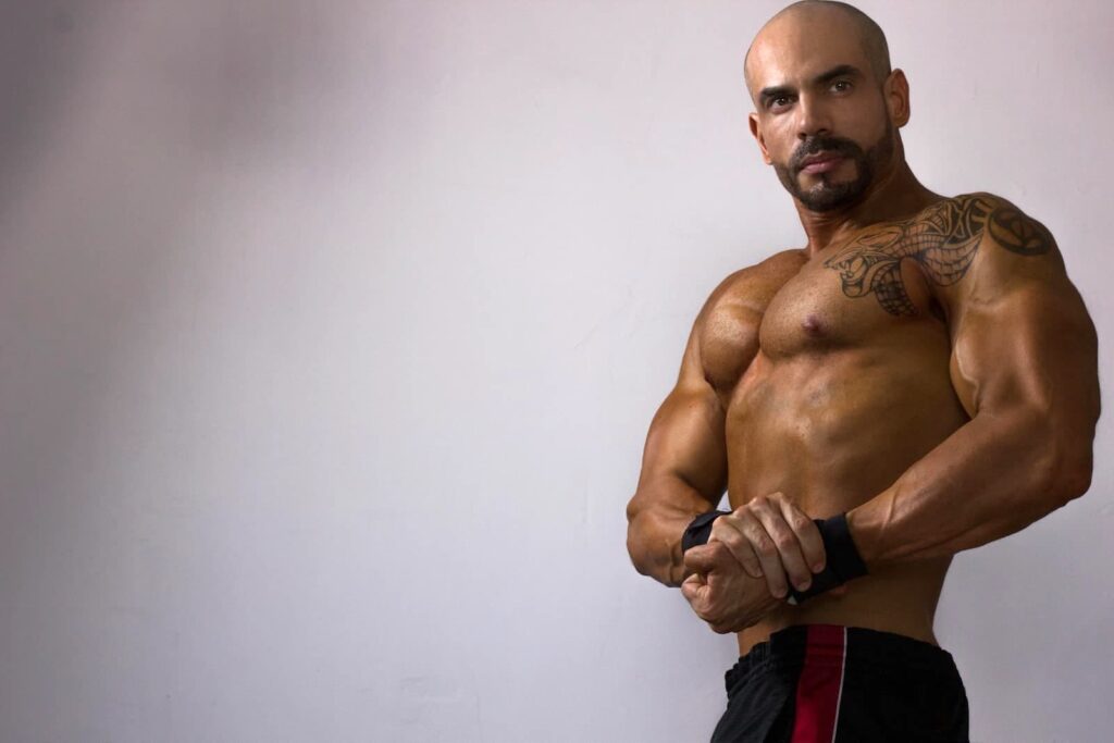 A bodybuilder flexing his muscles