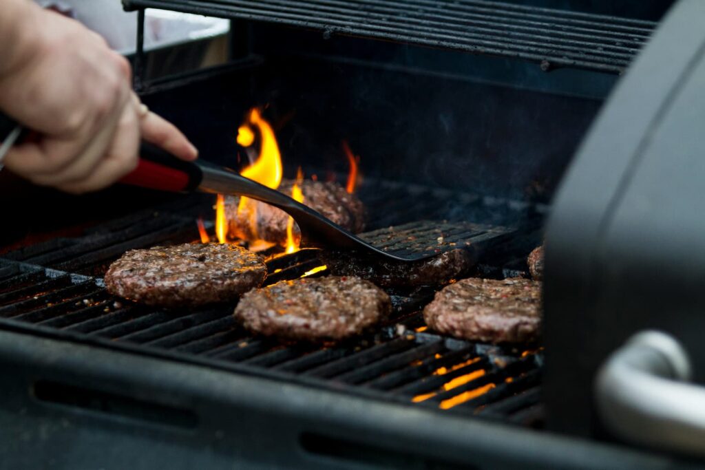 Hamburger patties on a grill