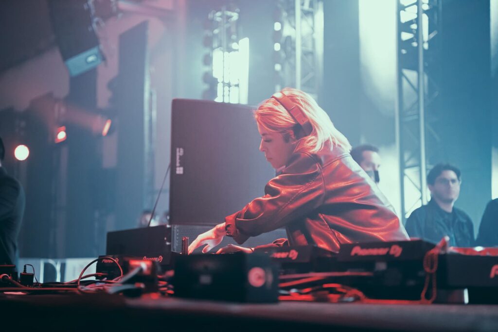 A DJ performing in a club