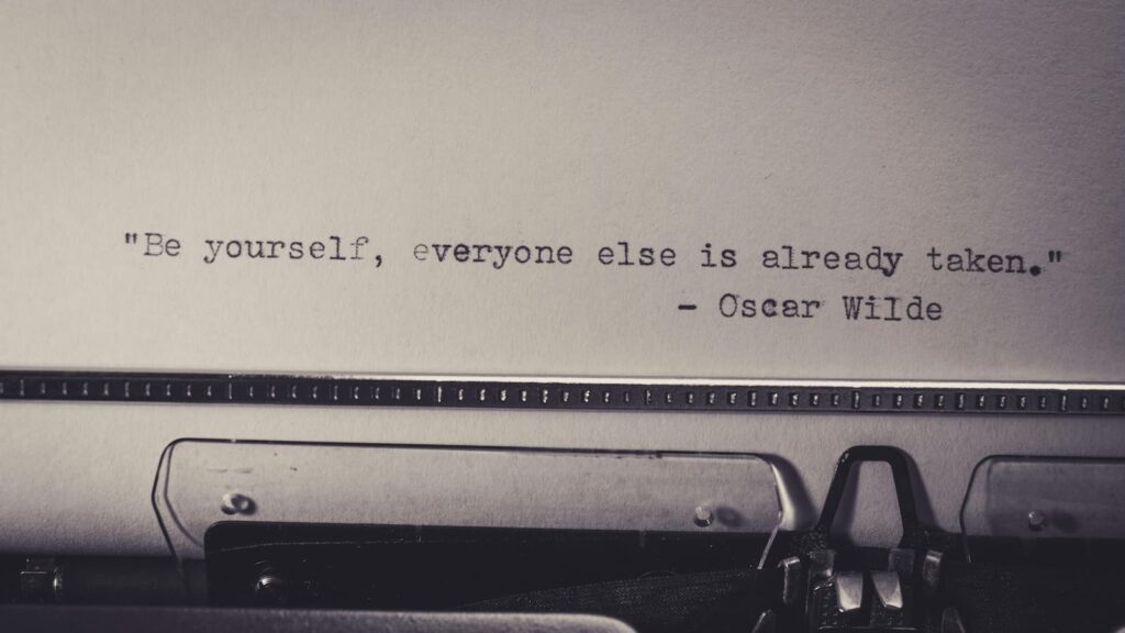 A quote from writer Oscar Wilde typed on a piece of paper in a typewriter