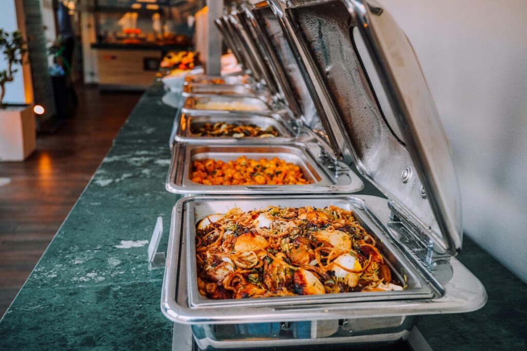 A long table of food at a buffet