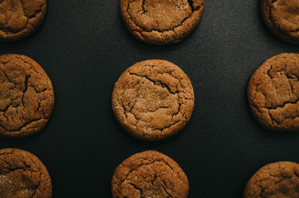 Brown cookies on a dark gray background